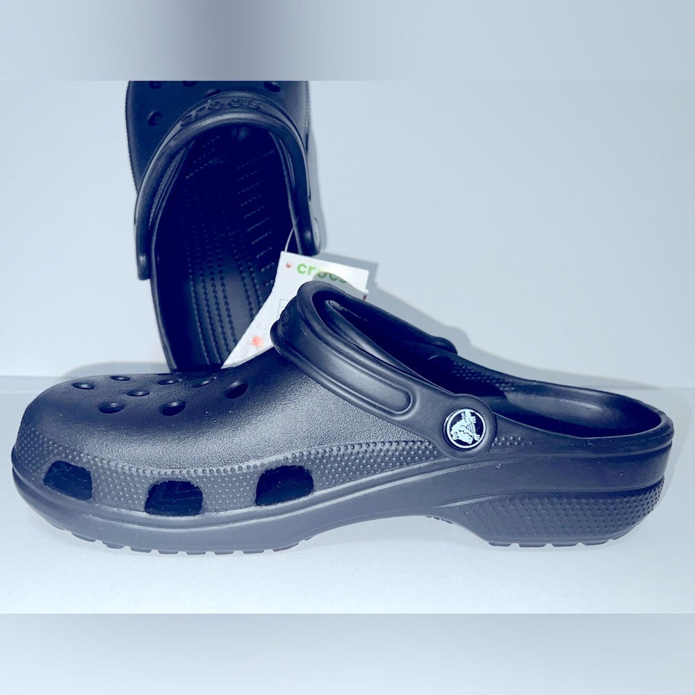 Unisex Crocs. Size 7 for men. Size 9 for women. Black